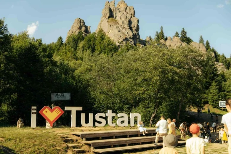 Tustan landmark with tourists